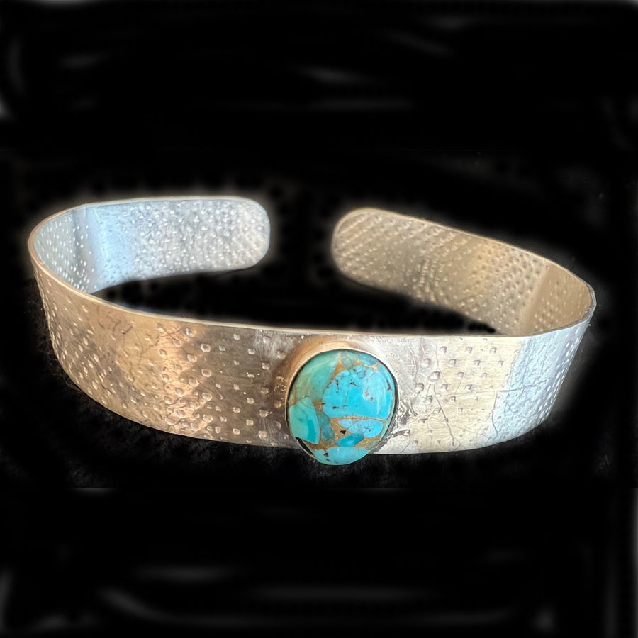 Sterling Silver cuff with a turquoise stone