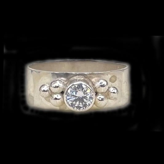 Sterling Silver with diamond and silver balls on each side